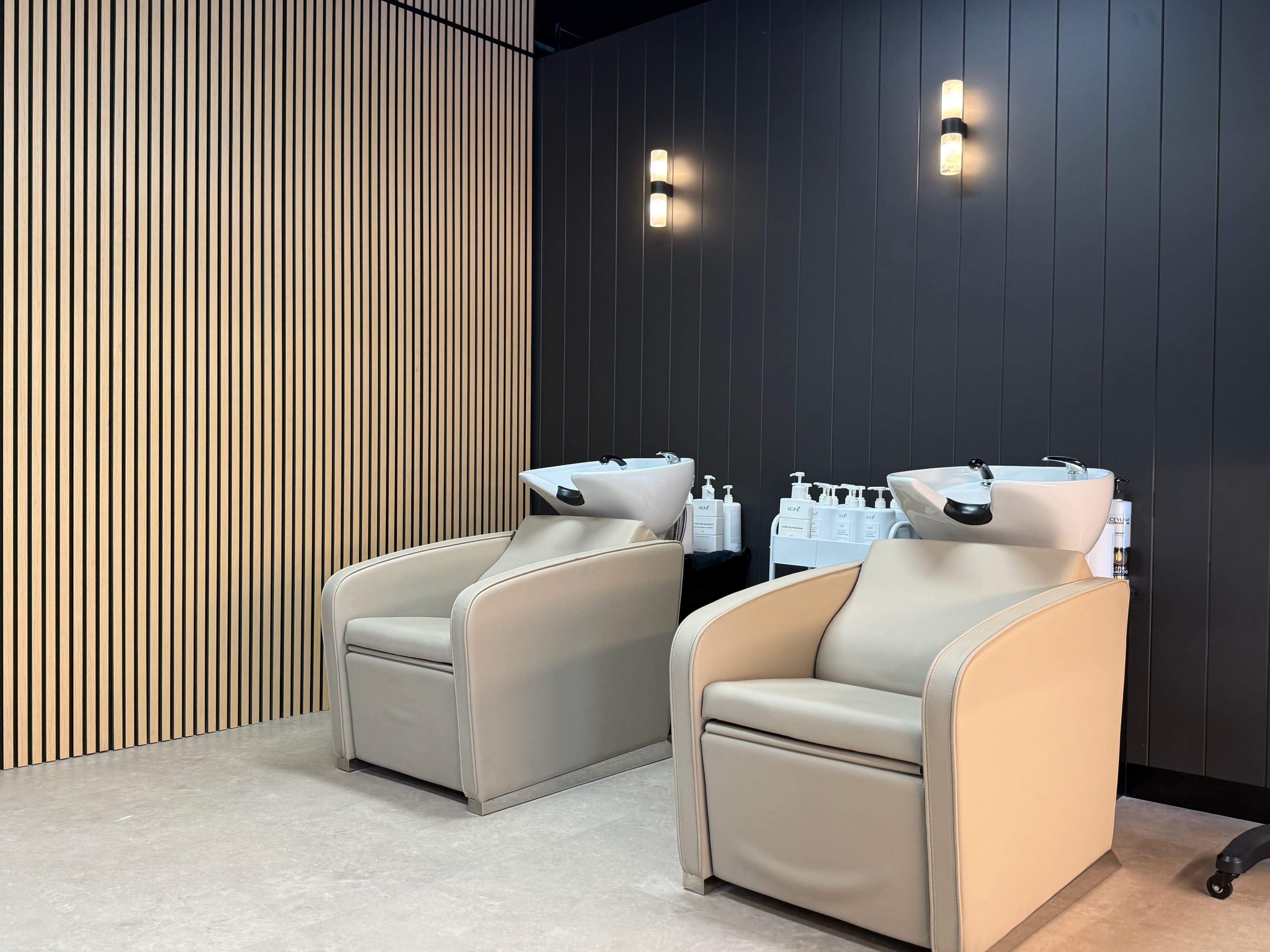 Japanese hair spa with acoustic natural oak slat panels at Elixir Aesthetic, East Perth