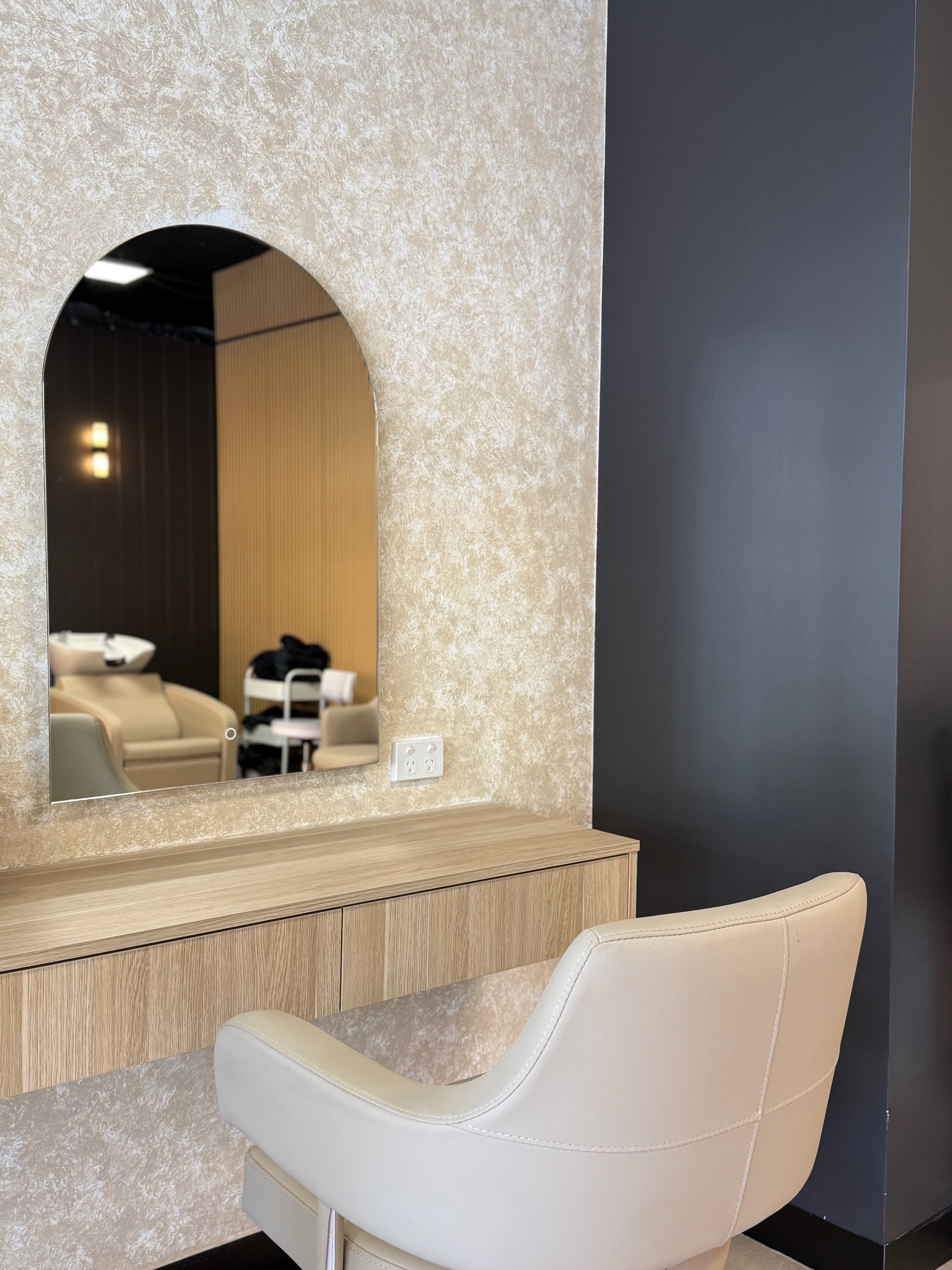 Hair styling station with arch mirror at Elixir Aesthetic, East Perth