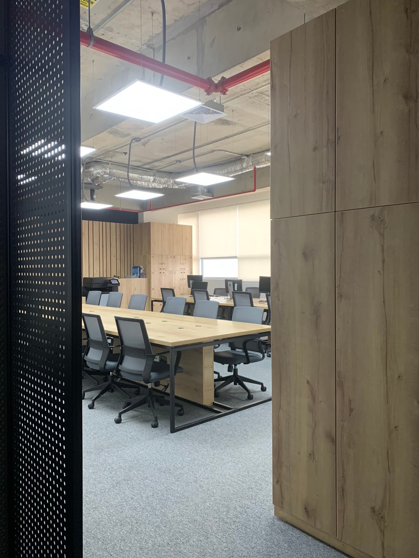 Commercial office corridor and workstations, Lima, Peru